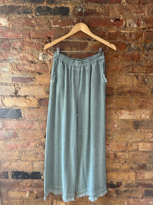 Green linen trousers