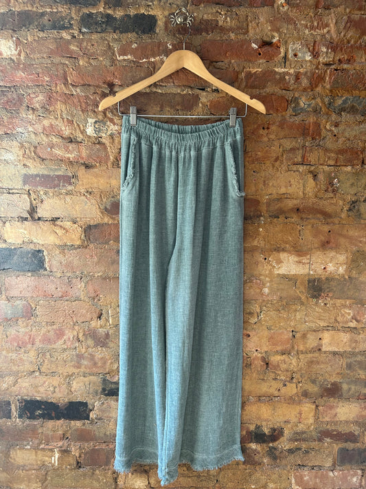 Green linen trousers
