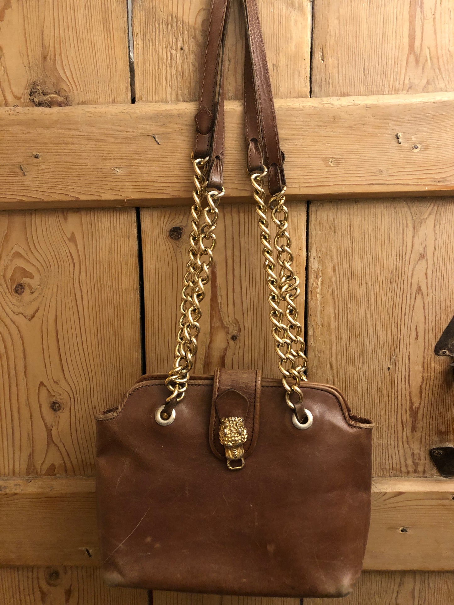 1980s leather shoulder bag with leopard buckle